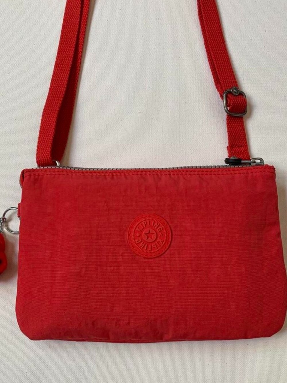 Kipling Red Mikaela Crossbody Bag with Circular Logo & Adjustable Strap